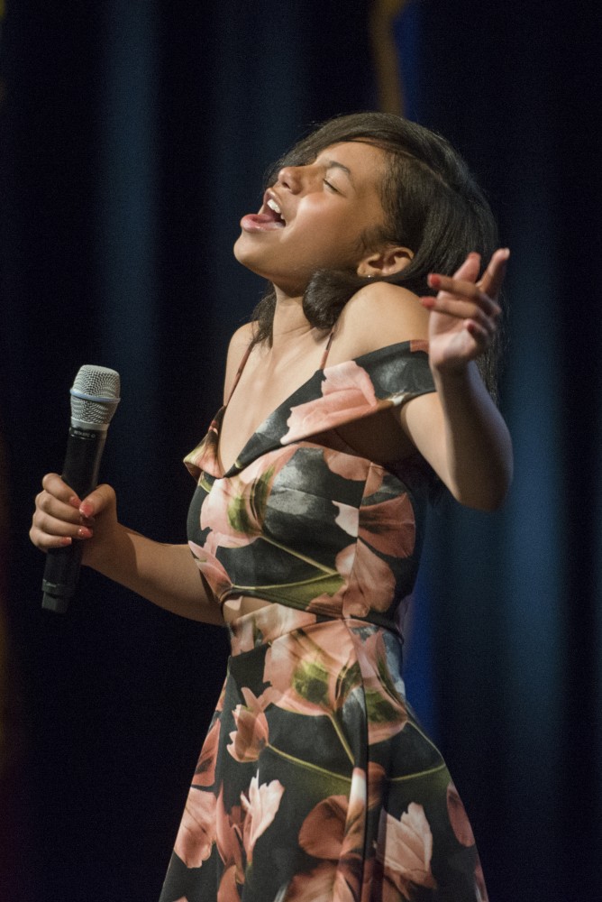 Tianna Novak, eighth grader at Northeast Middle School in Minneapolis, performs Listen by Beyonce at her graduation ceremony on Thursday, June 7.