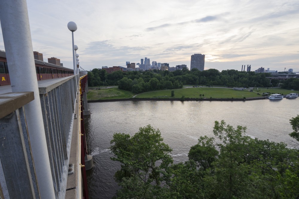The Mississippi River flows past the University of Minnesota campus on June 21.