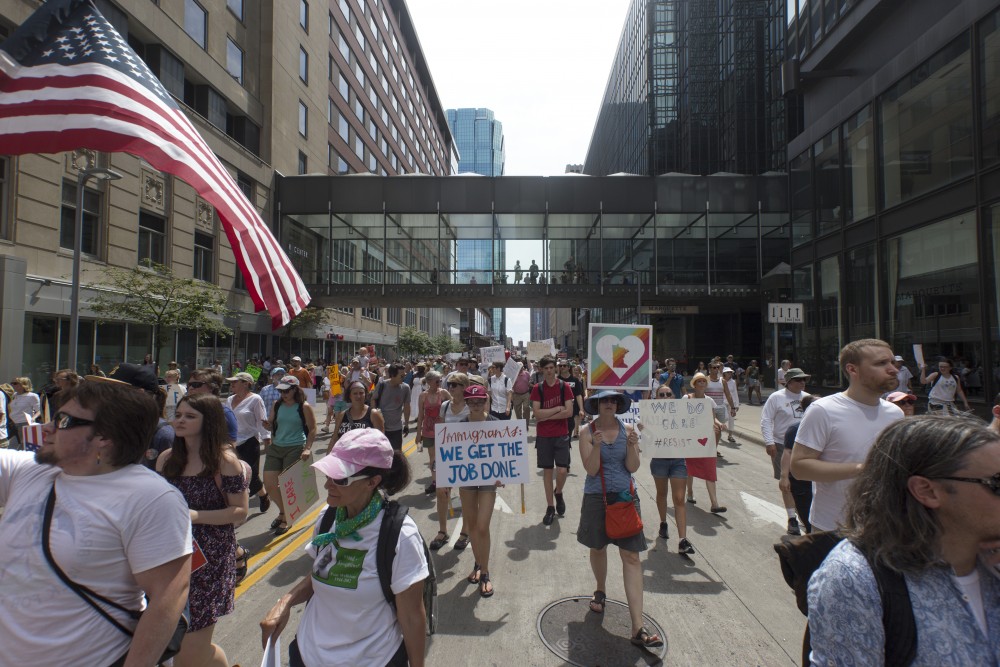 The Free Our Future marchers process past viewers in the skyway on Saturday, June 30 in downtown Minneapolis.