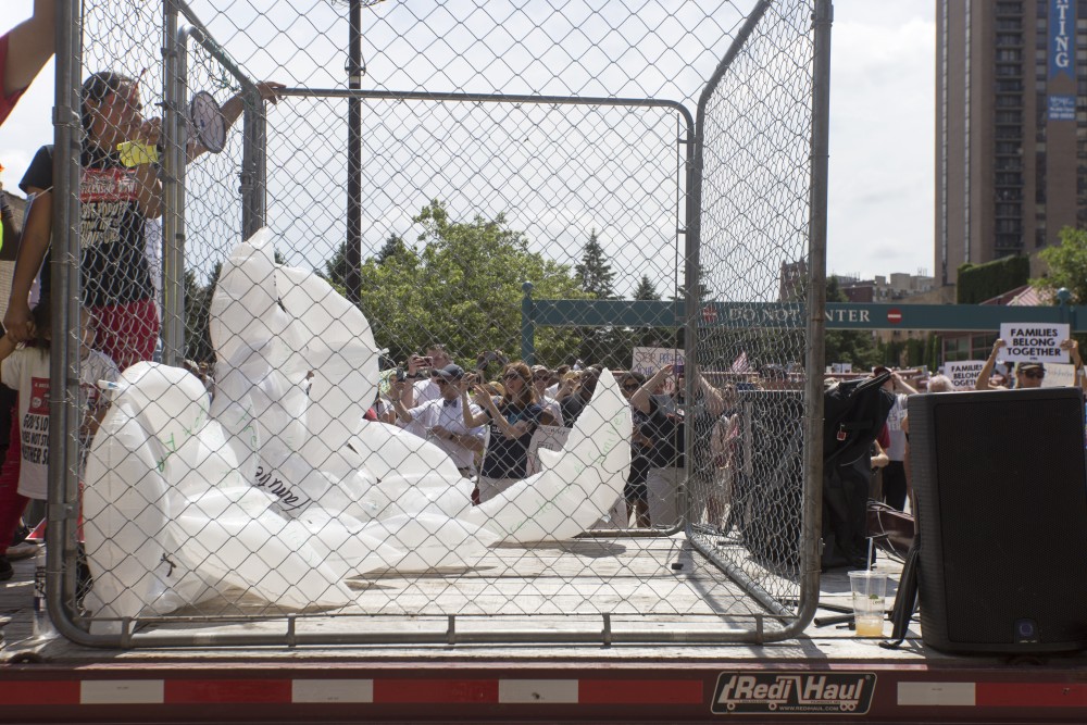 A cage float passes at the Free Our Future march on Saturday, June 30 in downtown Minneapolis.