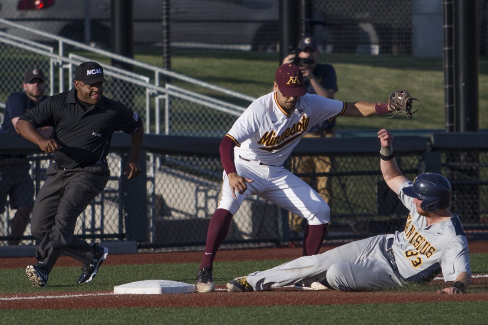 Micah Coffey makes an out on third base during the game against Canisius on Friday, June 1, 2018 at Siebert Field. The Gophers won 10-1.