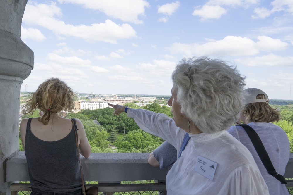 University Professor Amy Kaminski points to the area where developments are being proposed near Prospect Park. The Prospect Park Association is concerned with the height of proposed developments, as Witchs Hat Tower is built on the tallest natural point in Minneapolis.