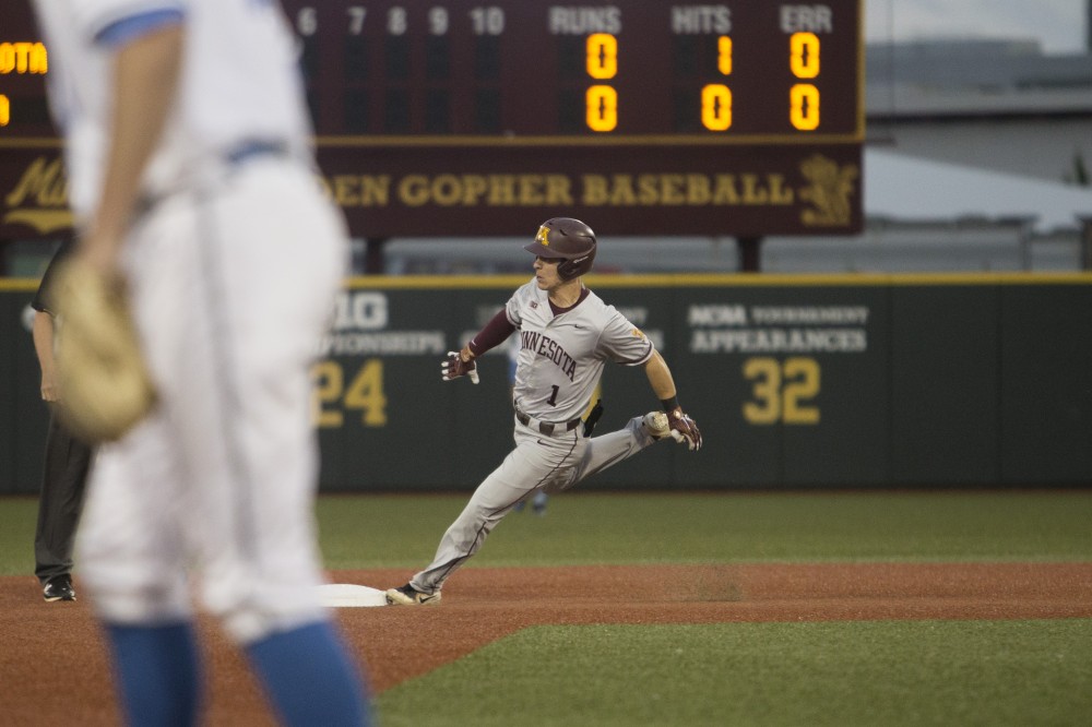Outfielder Ben Mezzenga rounds second base during the game against UCLA on Saturday, June 2, 2018 at Siebert Field. The Gophers won 3-2.