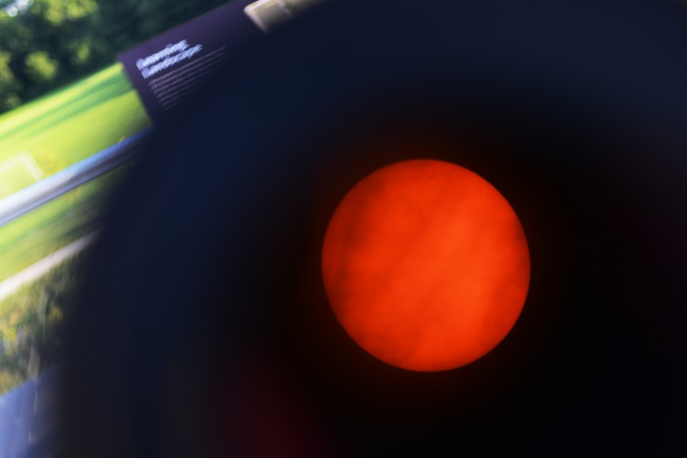 A view of the sun through a telescope on the observation deck.