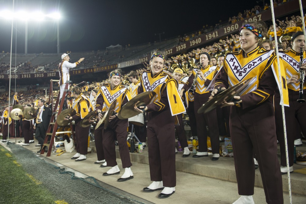 The University of Minnesota Marching Band cheers on the Gophers at TCF Bank Stadium on Thursday, Aug. 30. The Gophers defeated the New Mexico State Aggies 48-10.