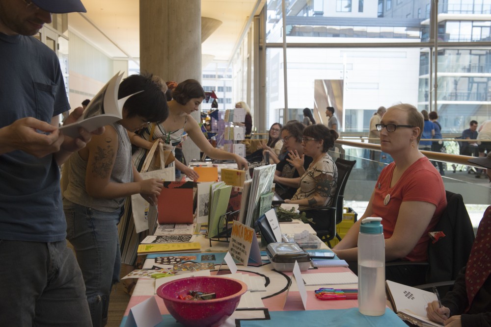 Community members attend Twin Cities Zine Fest on Saturday, Sept. 15, 2018 at Minneapolis Central Library. Local zine creators present and sell their zines at the fest.