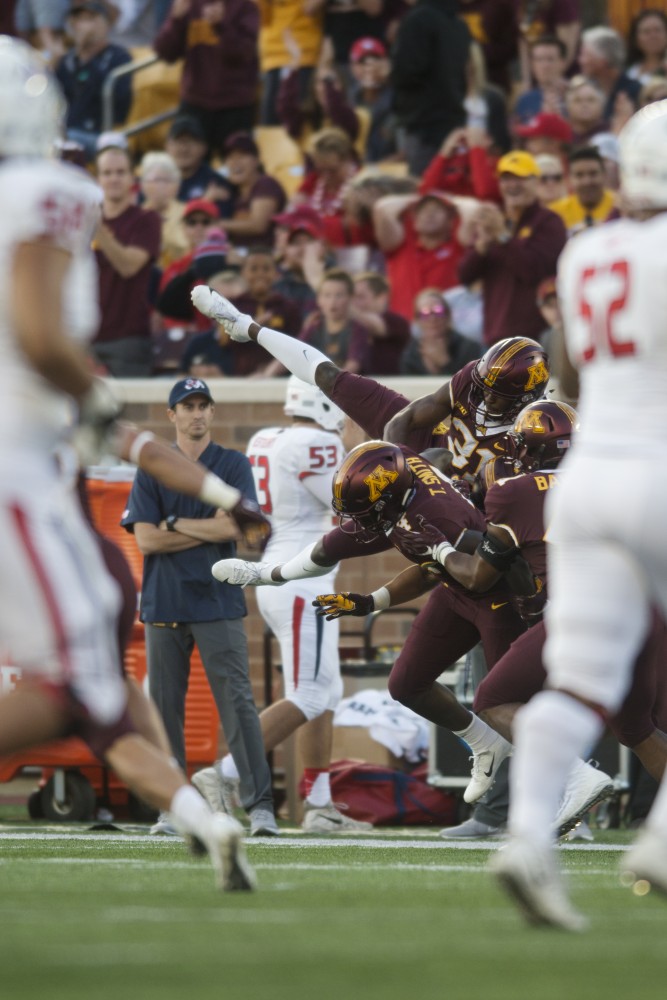 The Gophers carry the ball at TCF Bank Stadium on Saturday, Sept. 8. The Gophers defeated Fresno State 21-14. 