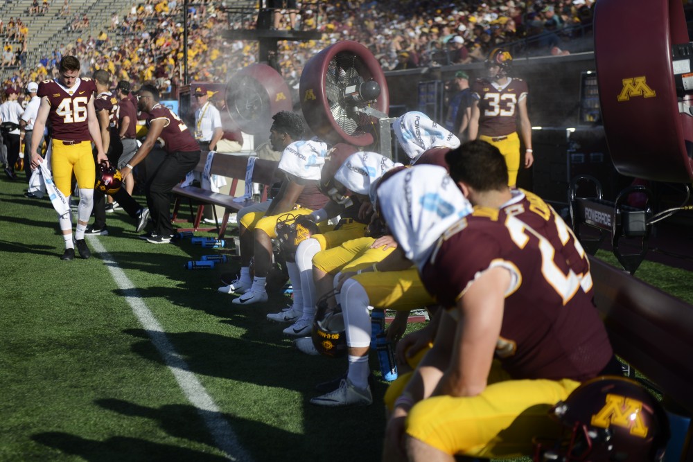 Gopher football players attempt to cool off during their game against Miami University on Saturday, Sept. 15 at TCF Bank Stadium in Minneapolis. 