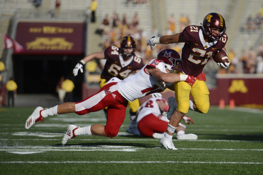 Freshman Bryce Williams keeps the ball away from Miami University on Saturday, Sept. 15 at TCF Bank Stadium in Minneapolis.