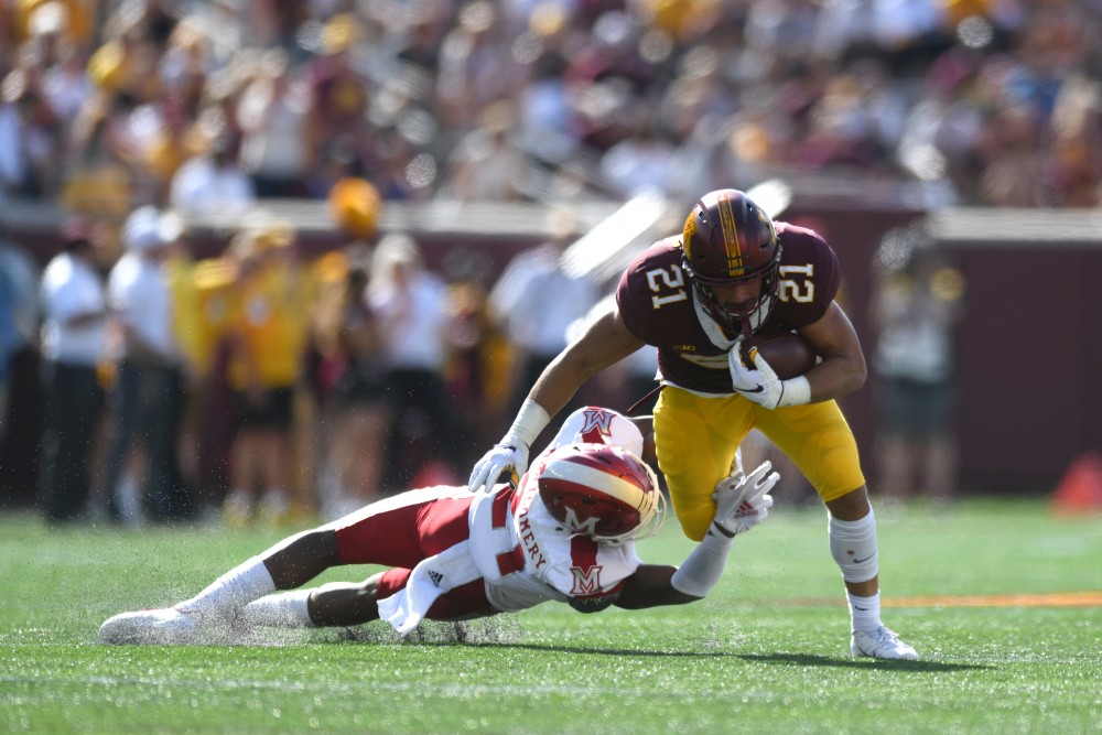 Freshman Bryce Williams avoids a tackle on Saturday, Sept. 15 at TCF Bank Stadium in Minneapolis.