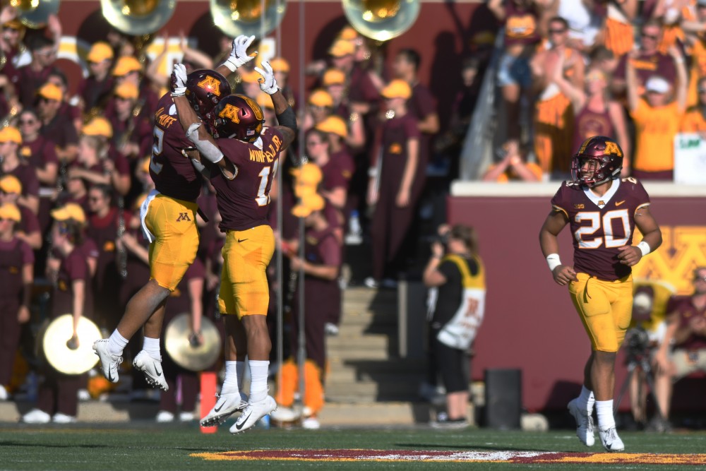Jacob Huff and Antoine Winfield Jr. celebrate after a touchdown on Saturday, Sept. 15 at TCF Bank Stadium in Minneapolis.
