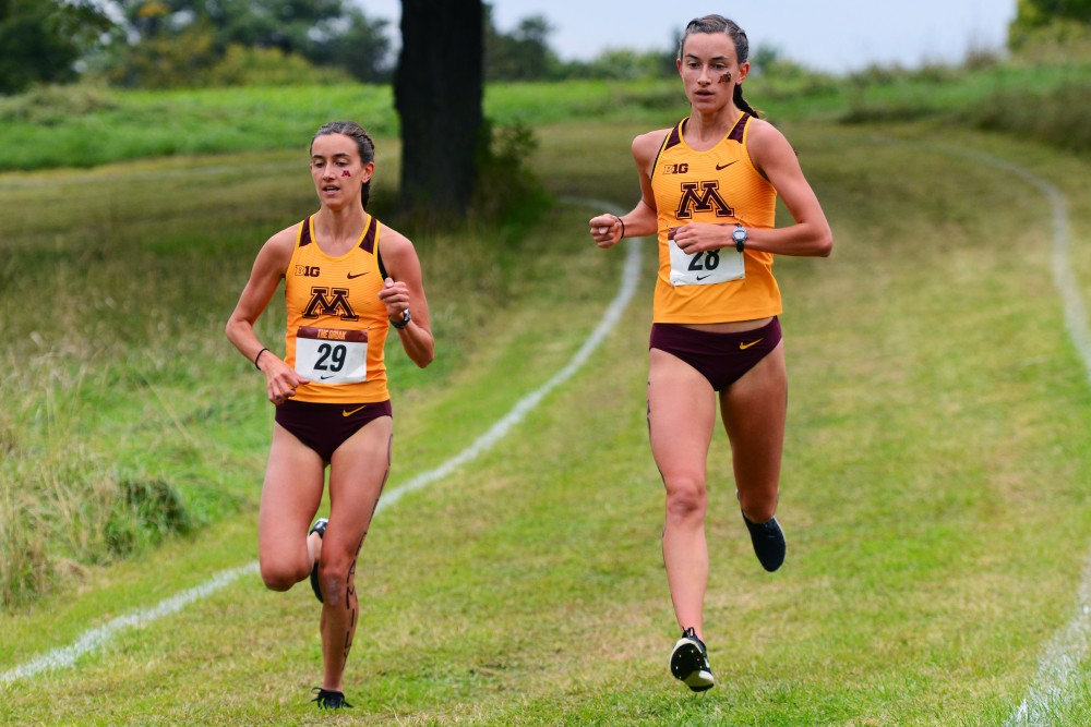 Bethany and Megan Hasz finished first and second overall at the 33rd annual Roy Griak Invitational at Les Bolstad Golf Course on Saturday, Sept. 29, 2018. 