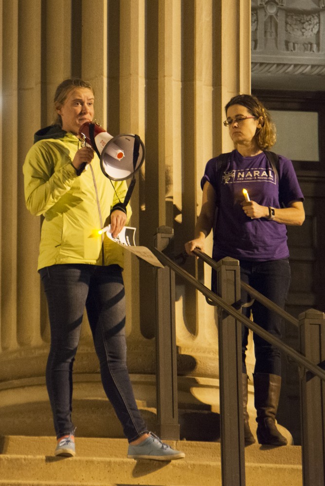 Supporters of Dr. Christine Blasey Ford gathered at Northrop Plaza for a vigil on Wednesday, Oct. 3. Tracy Kidwell, a student at the university, spoke to supporters about her own sexual assault and her reasoning behind supporting survivors. 