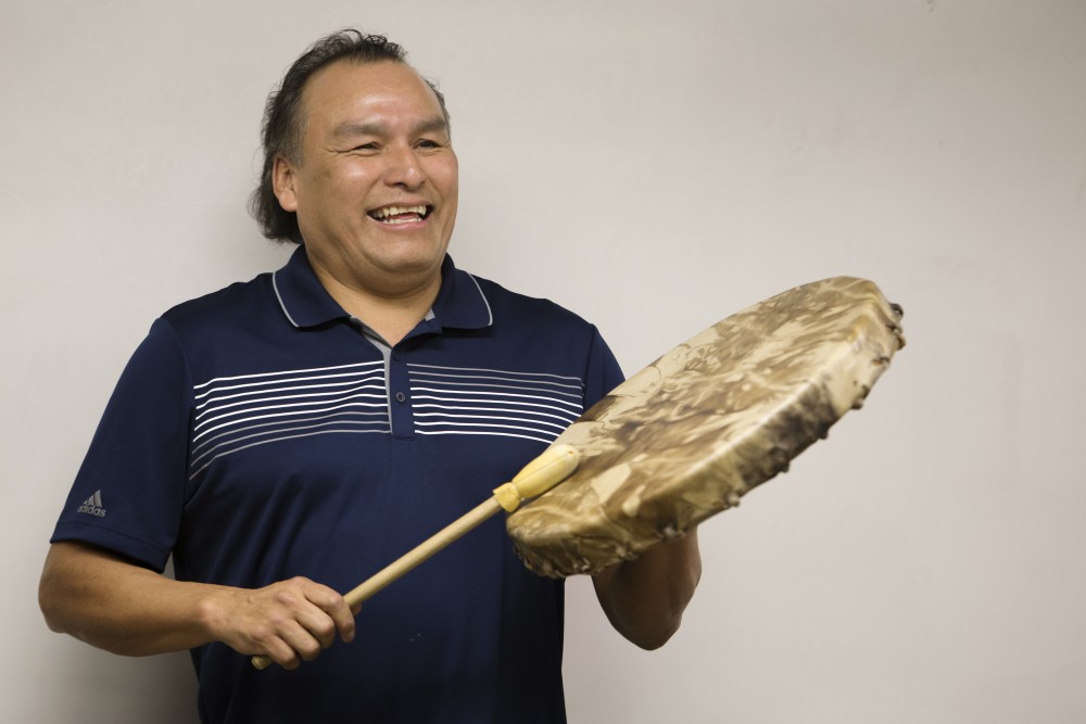 Anishinaabe Language Instructor Gabe Desrosiers plays a traditional Native American drum for his Native American dance class on Wednesday, Oct. 3 at the University of Minnesota-Morris campus. Desrosiers did his undergraduate education and masters degree in the University of Minnesota system, covered by the Native American tuition waiver. 