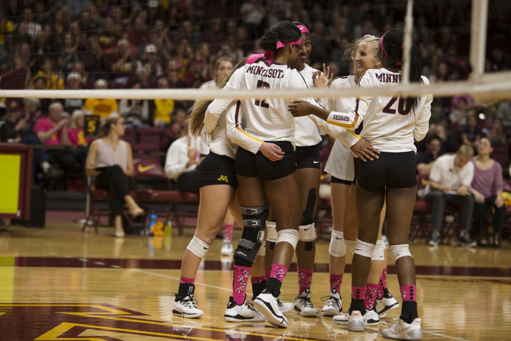 Stephanie Samedy positively signals to her teammates after earning a point during the game against the Northwestern Wildcats on Saturday, Oct. 13, 2018. The Gophers beat Northwestern in all three sets.