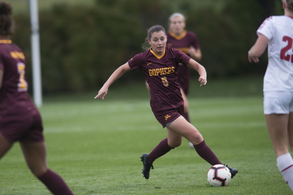 Forward Maddie Castro moves the ball up field. Gopher womens soccer lost to Wisconsin 3-2 at Elizabeth Lyle Robbie stadium on Saturday, Oct. 13. 