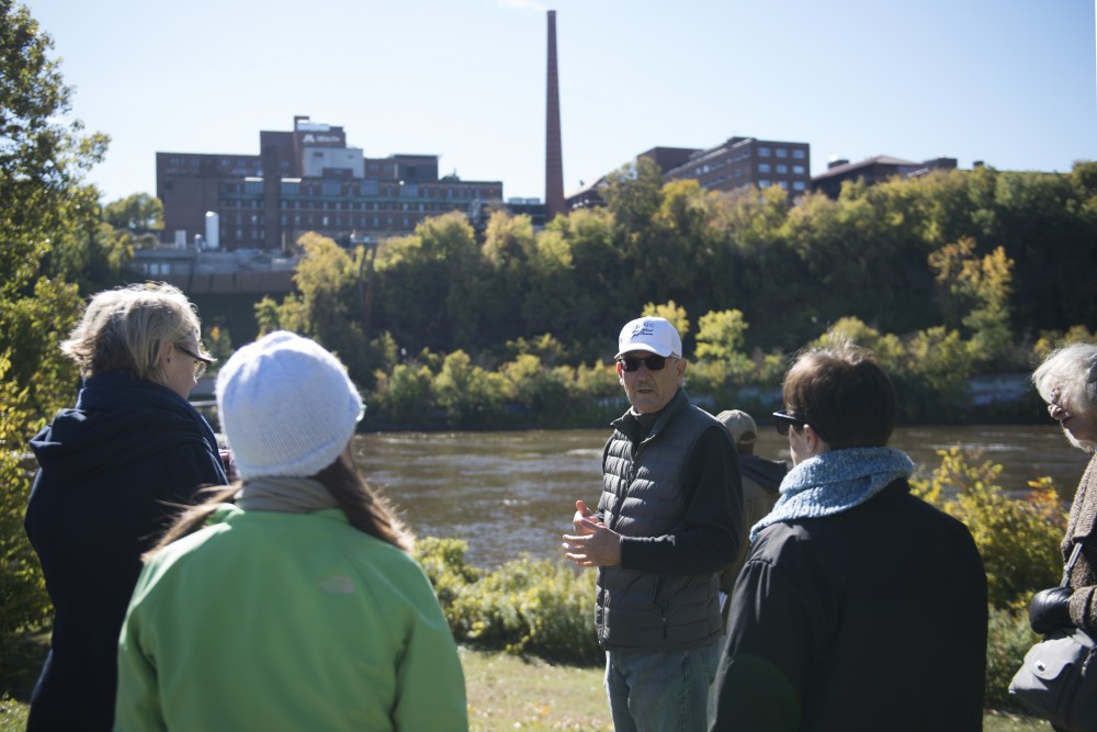 Doug Snyder of the Mississippi Watershed Management Organization explains how water flows through the East Bank campus into the Mississippi River on Wednesday, Oct. 17. 