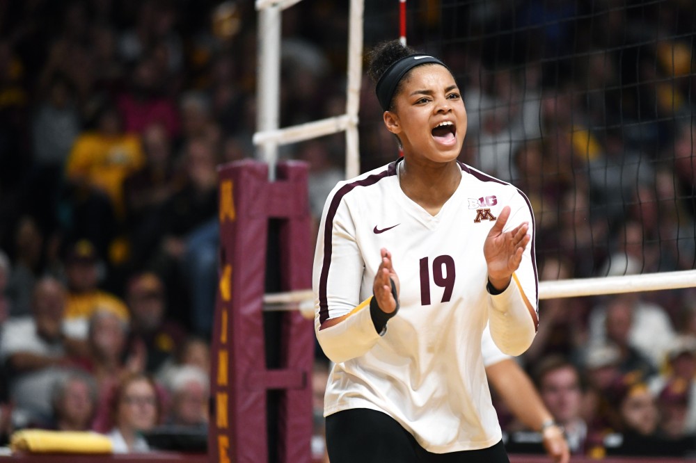 Junior Alexis Hart celebrates after the gophers scored against Iowa on Friday, Oct. 19, 2018 at Maturi Pavilion. 