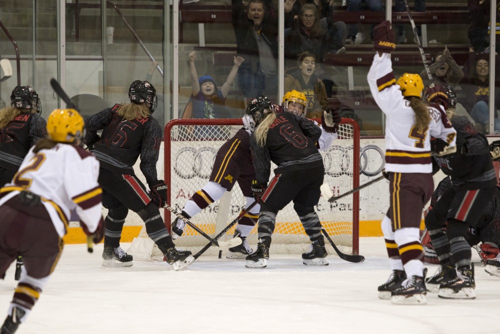 The Gophers celebrate a goal at Ridder Arena on Friday, Oct. 19. 