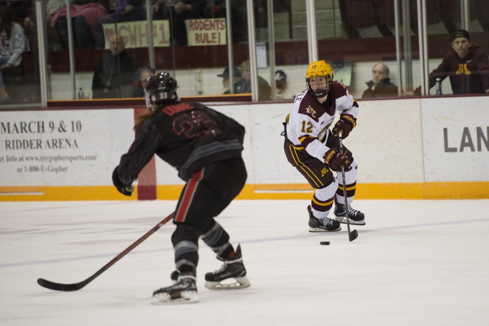 Sophomore forward Grace Zumwinkle eyes her opponent at Ridder Arena on Friday, Oct. 19. The Gophers beat Ohio State 3-0. 