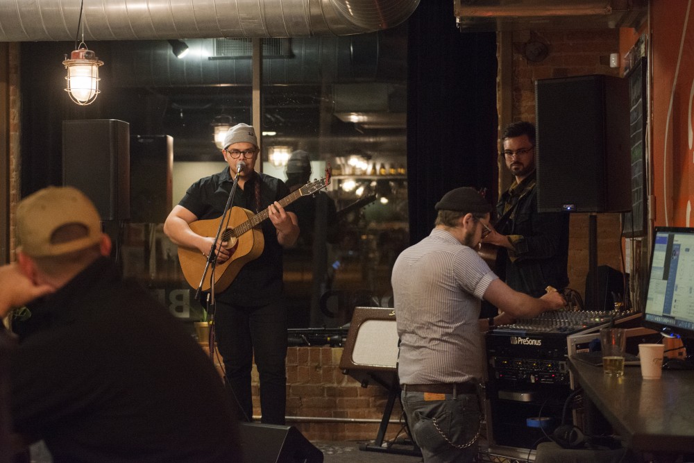 Regional Dialect, a local music duo consisting of Mathias Hertel, left, and Colin Doherty, performs at Bummer Strummer Sessions at Five Watt Coffee on Friday, Oct. 21.