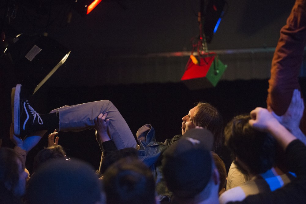 An audience member crowd surfs during the band Pierres performance on Friday, Oct. 19 at Studio Six in Northeast Minneapolis.