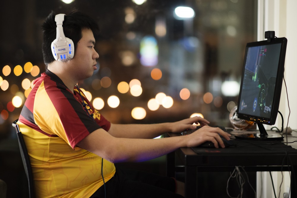 James Han plays a game of Overwatch with the University ESports team on Sunday, Oct. 28. While Han typically serves as the teams manager, he is filling in for a sick teammate during this Sunday tournament.