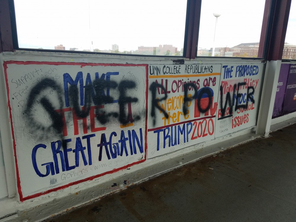 The University of Minnesota chapter of College Republicans panel on the Washington Avenue Bridge is seen on Saturday, Oct. 13. The groups panel was vandalized overnight.