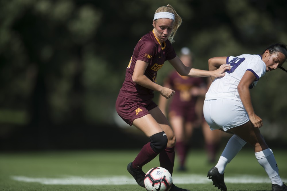 Midfielder Megan Gray fights for the ball at Elizabeth Lyle Robbie Stadium on Sunday, Sept. 16. The Gophers defeated Northwestern 2-0. 