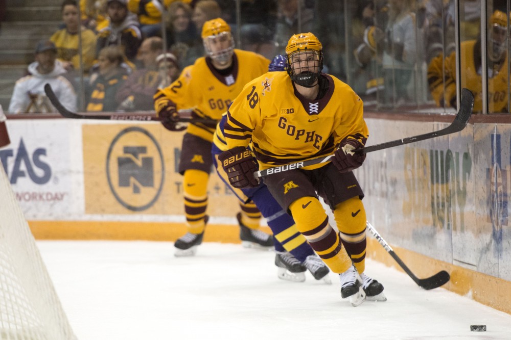 Defender Clayton Phillips skates with the puck at 3M Arena at Mariucci on Friday, Nov. 2. The Gophers fell to Minnesota State with a final score of 5-1. 