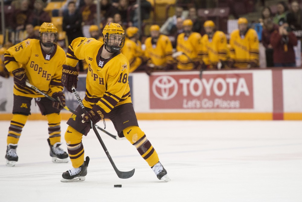 Defender Clayton Phillips skates with the puck at 3M Arena at Mariucci on Friday, Nov. 2. The Gophers fell to Minnesota State with a final score of 5-1. 