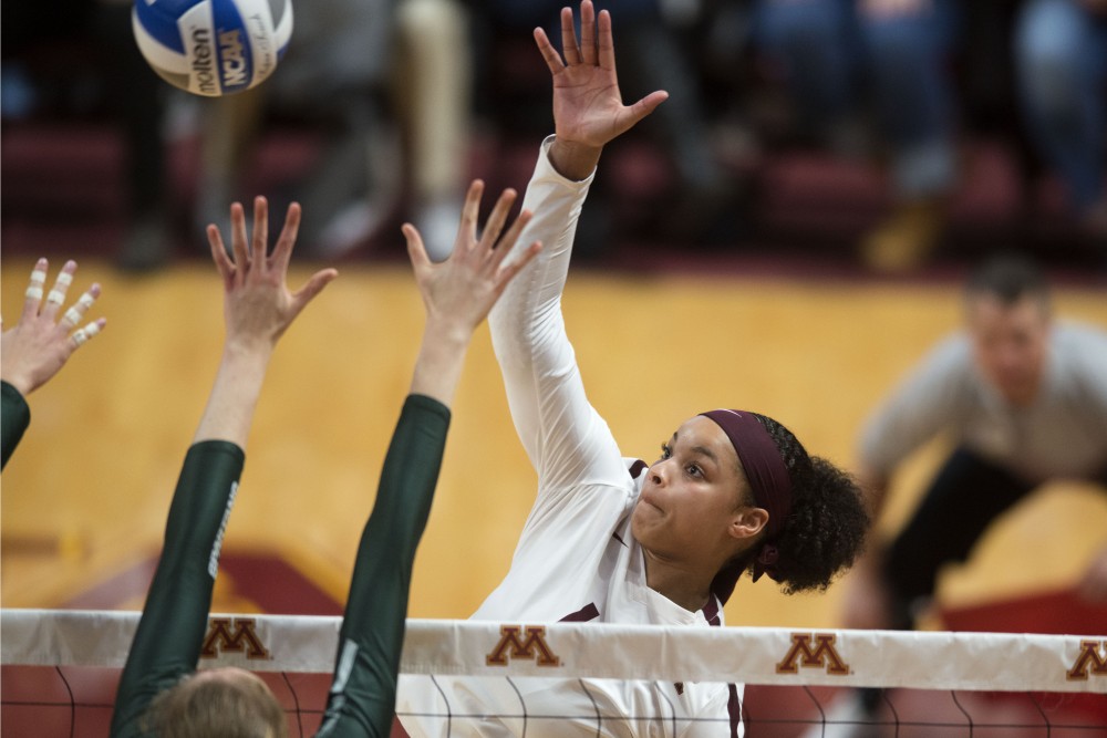 Junior Alexis Hart hits the ball at Maturi Pavillon on Saturday, Nov. 3. The Gophers won 3-2 against Michigan State and Hart scored her thousandth kill.