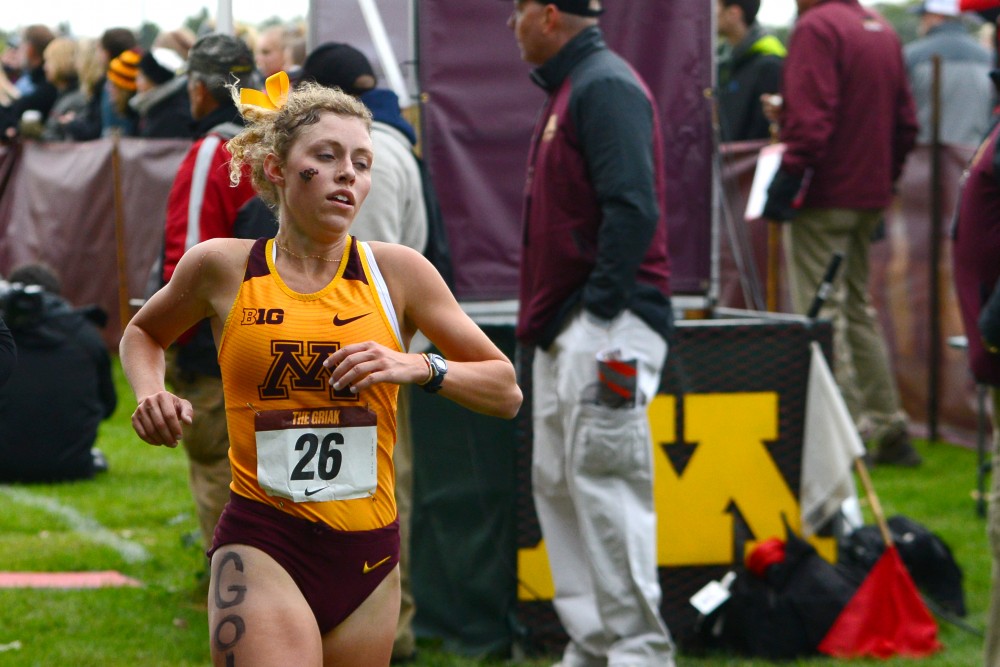 Molly Eastman crosses the finish line at the Roy Griak Invitational at Les Bolstad Golf Course on Saturday, Sept. 29. 