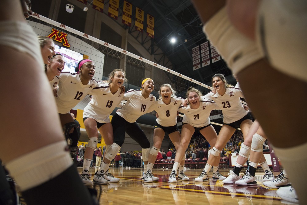 The Gopher celebrate a sweep over Indiana at Maturi Pavilion on Friday, Nov. 9, 2018. 