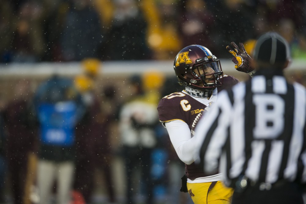 Quarterback Seth Green celebrates after his touchdown on Saturday, Nov. 10 at TCF Bank Stadium. The Gophers beat Purdue 41-10. 