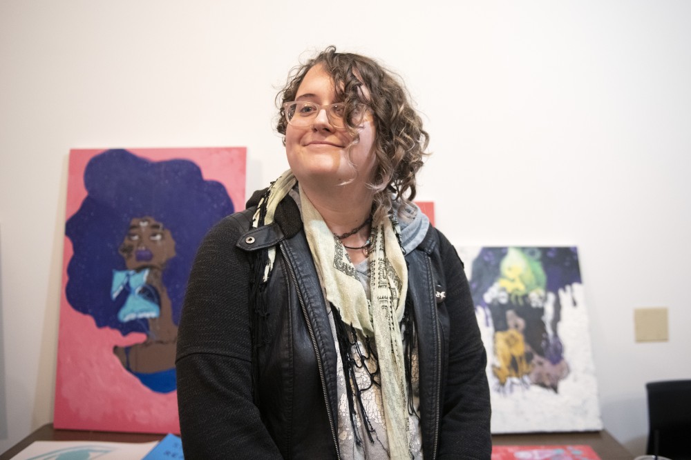 University of Minnesota student Lyd Mor talks about an art show they hosted on Saturday, Oct. 27 at Boneshaker Books in Minneapolis. Mor hosted the art show for the transgender community. 