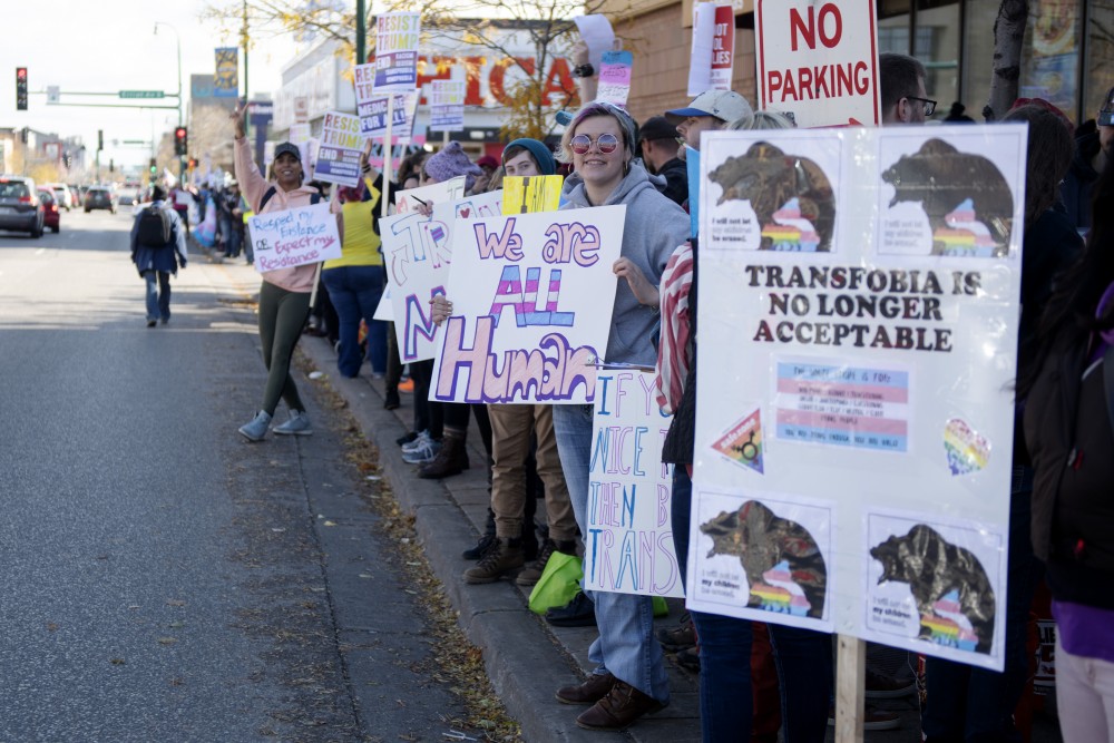 Protesters stand on Lake Street in Minneapolis in support of transgender rights on Sunday, Oct. 28. 