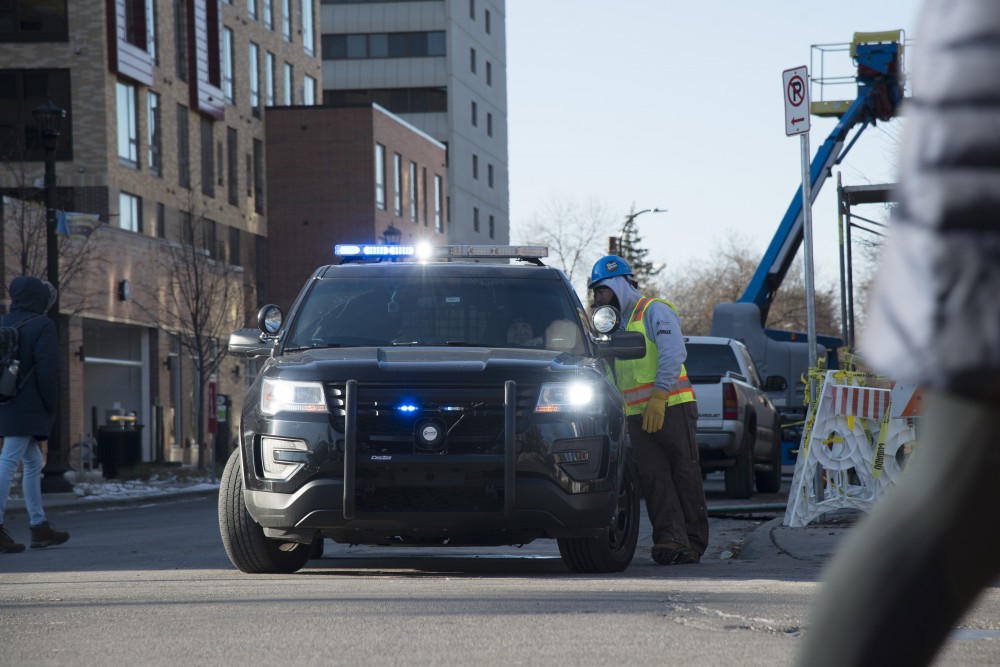 A Minneapolis Police officer patrols Dinkytown on Tuesday, Nov. 13, 2018.