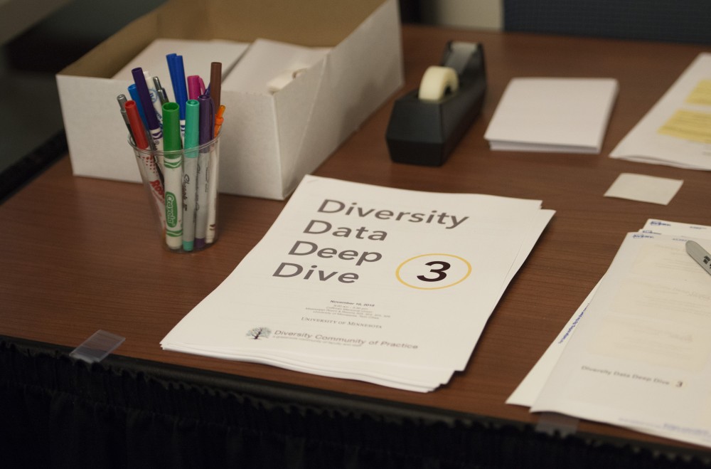 Packets sit on a table at the Diversity Data Deep Dive held in Coffman Memorial Union on Friday, Nov. 16. 