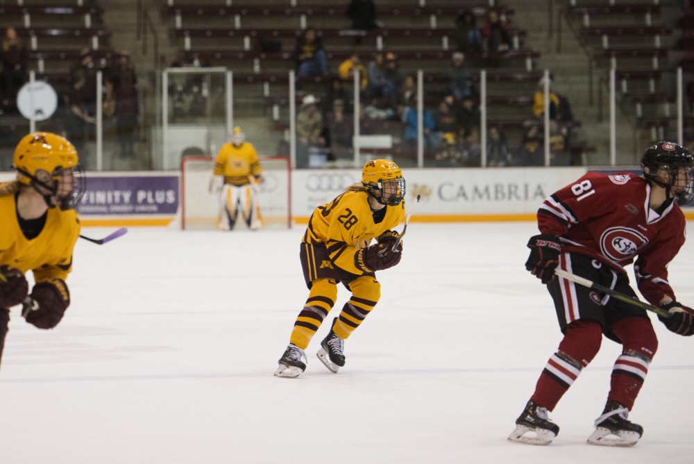 Sophomore forward Taylor Wente eyes the puck during the game against St. Cloud on Sunday, Nov. 18 at Ridder Arena. 
