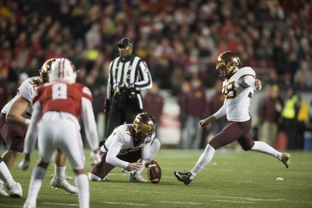 Kicker Emmitt Carpenter hits a field goal at Camp Randall Stadium in Madison on Saturday, Nov. 24. The Gophers beat the Badgers 37-15 for the first time since 2003.