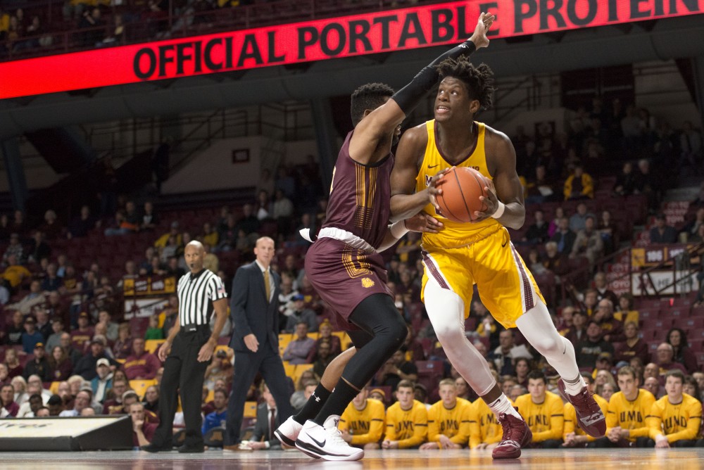 Center Daniel Oturu drives towards the hoop at Williams Arena on Thursday, Nov. 1. The Gophers defeated the Bulldogs 109-53. 