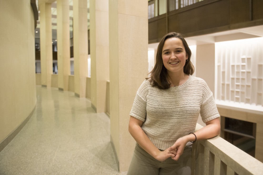 University junior Meara Cline, sexual assault task force chair for the Minnesota Student Association, poses for a portrait in Northrup Auditorium on Monday, Dec. 3. Cline says she holds her position because she wants to make sure every student feels safe and valued on campus.