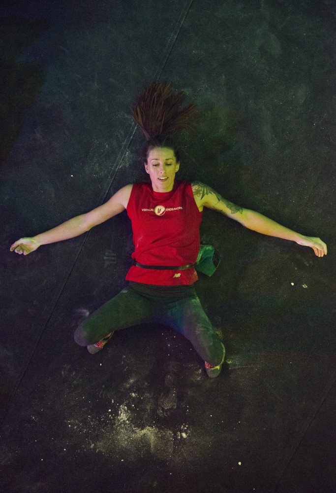 Alex Johnson lays on the ground after falling on an attempt of the final problem of Boulderfest North, a climbing competition hosted by the Minneapolis Bouldering Project, on Saturday, Nov. 10. 