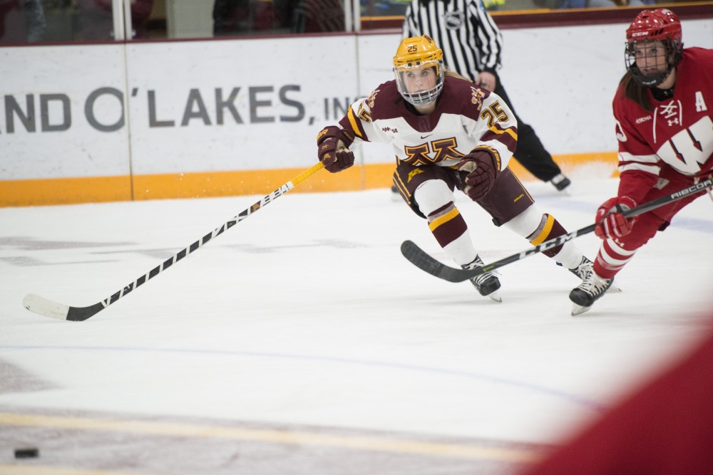 Redshirt senior Nicole Schammel skates toward the puck on Friday, Jan. 18 at Ridder Arena. The Gophers lost to the Wisconsin Badgers 2-1.