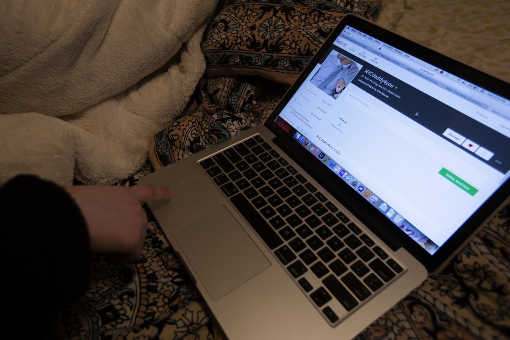University student Bella* shows an example of what navigating the SeekingArrangement website looks like on Monday, Jan. 14 in her apartment near campus. Ava communicated with several men on the website, getting compensated to spend time with them. 