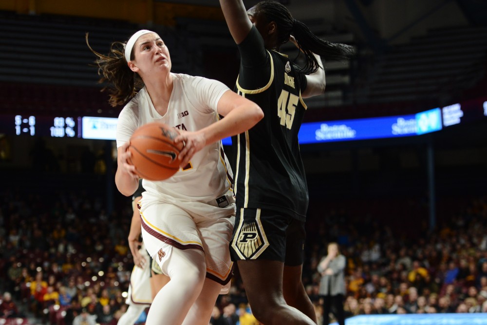 Freshman forward Delaynie Byrne eyes the hoop to shoot the ball during the game against Purdue on Thursday, Jan. 24. 