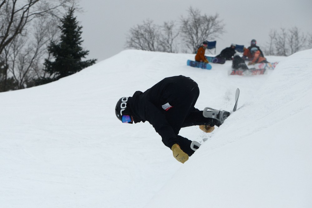 Luke Allen of Chaska prepares to snowboard down the halfpipe at Buck Hill on Saturday, Jan 26.