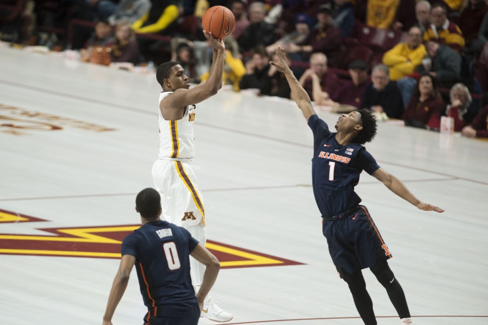 Sophomore Isaiah Washington shoots from the top of the key at Williams Arena on Wednesday, Jan. 30. The Gophers beat the Illinois Fighting Illini 86-75. 