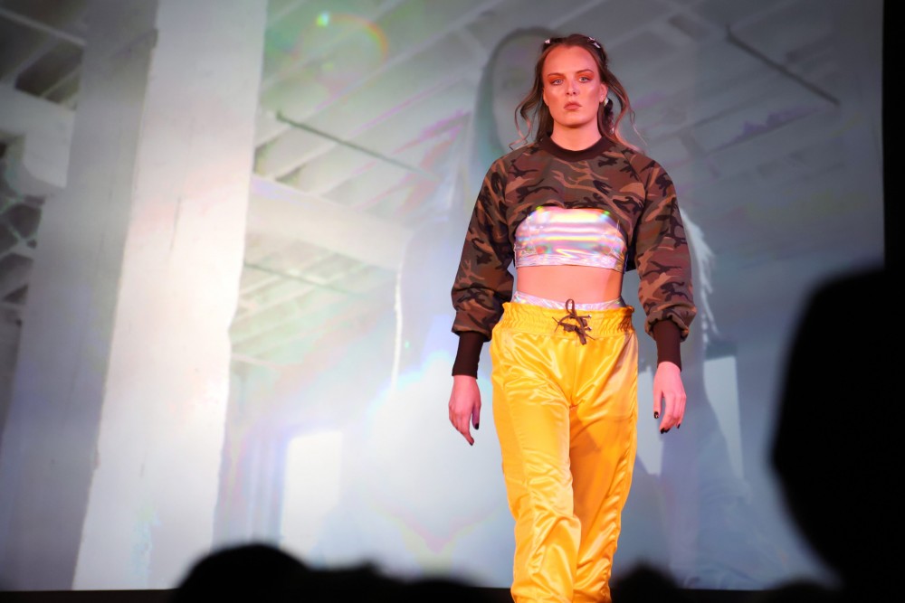 A model walks the runway during Emotion, the University of Minnesotas apparel design fashion show, on Saturday, Feb. 2 at Rapson Hall.